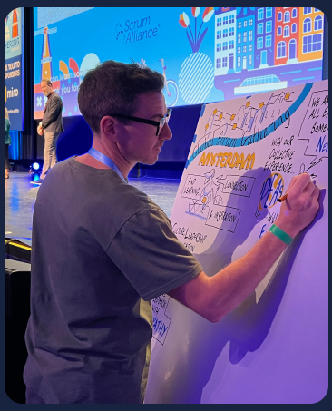 attendee writing down notes on a board at a gathering