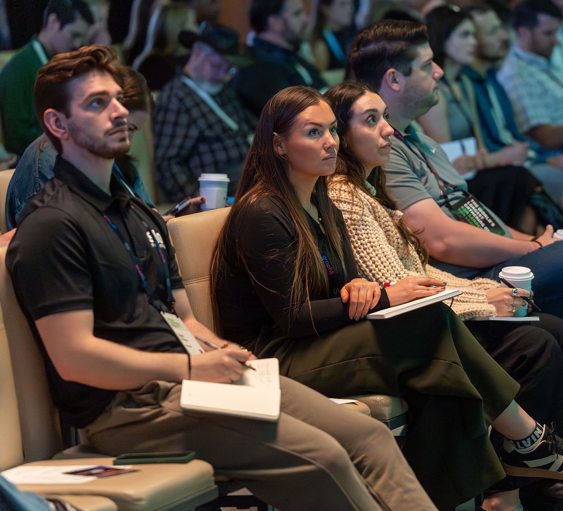 Attendees taking notes during a session at Pipeline 2025