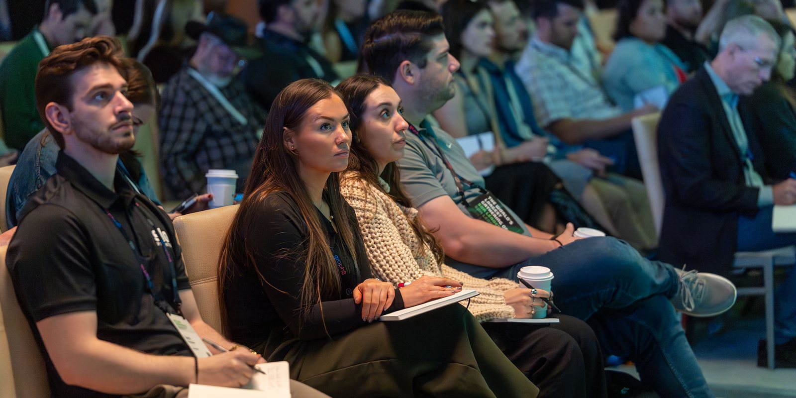 Attendees taking notes during a session at Pipeline 2025